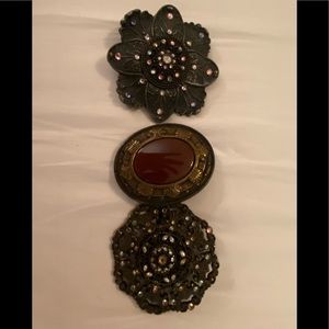 Three Beth Frank handmade belt buckles